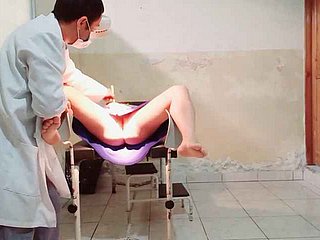 The doctor performs a gynecological exam above a womanlike patient he puts his finger round the brush vagina added to gets perturbed