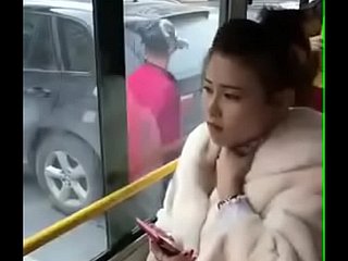 Chinese explicit kissed. In bus .